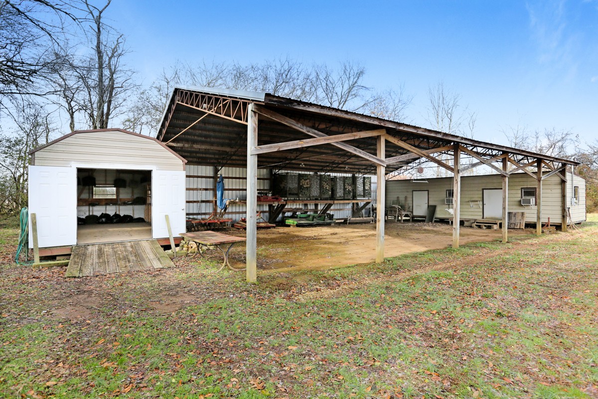 1449 Pleasant Hill Road Prospect, TN 38477 - Photo 5 of 26 a view of a house with a yard patio and deck