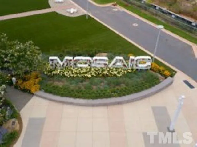 a view of a swimming pool with a yard