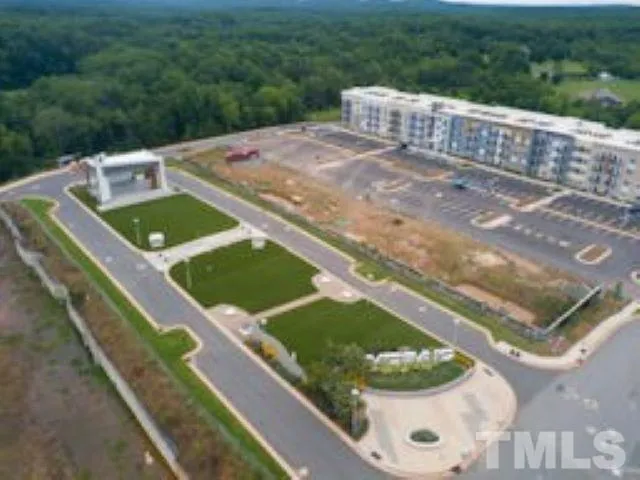 a view of a pool with a yard