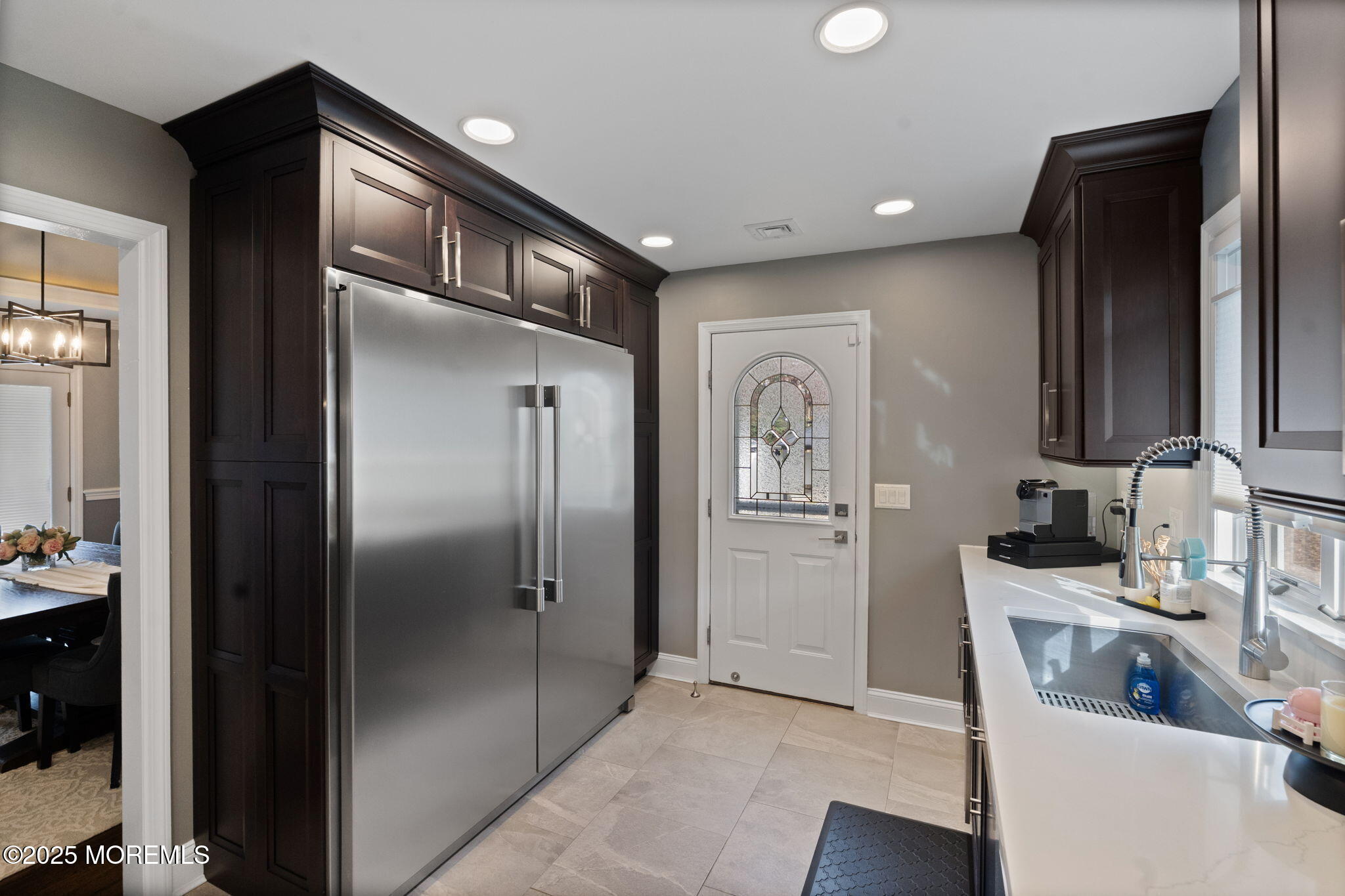 93 Wallace Road Middletown, NJ 07748 - Photo 12 of 47 a kitchen with stainless steel appliances granite countertop a refrigerator and a sink