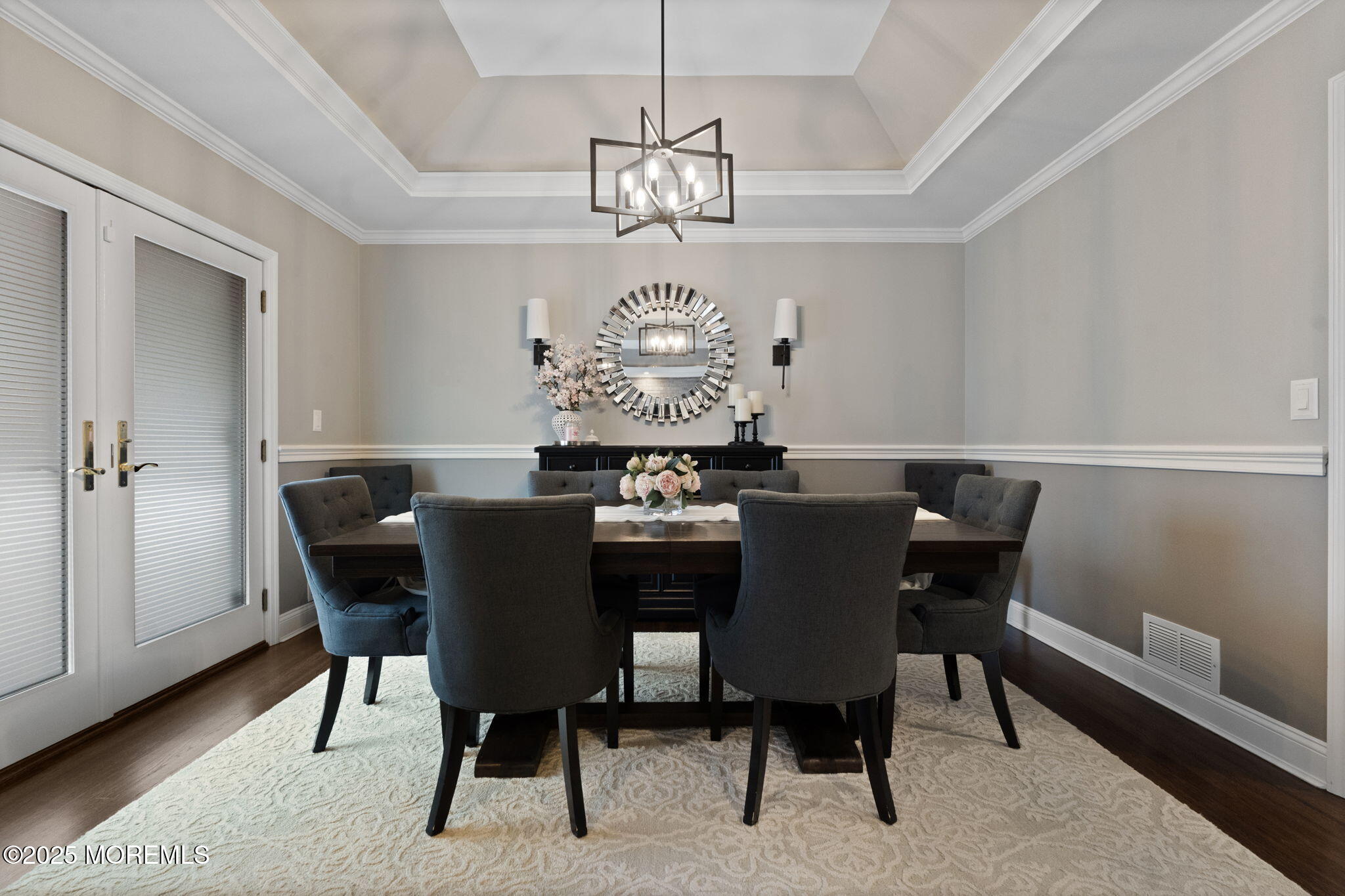 93 Wallace Road Middletown, NJ 07748 - Photo 13 of 47 a view of a dining room with furniture a chandelier and wooden floor