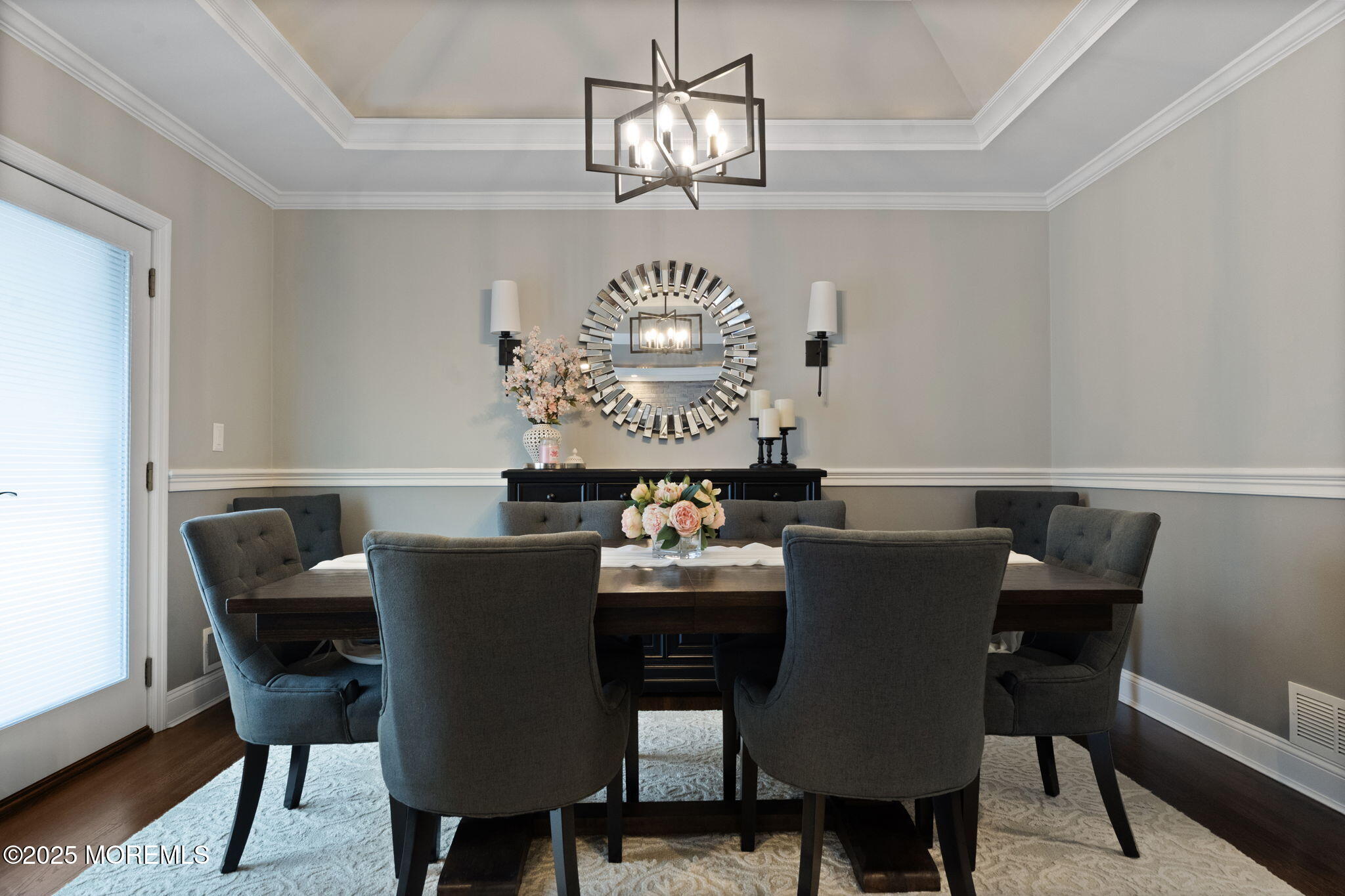 93 Wallace Road Middletown, NJ 07748 - Photo 14 of 47 a view of a dining room with furniture a chandelier and wooden floor