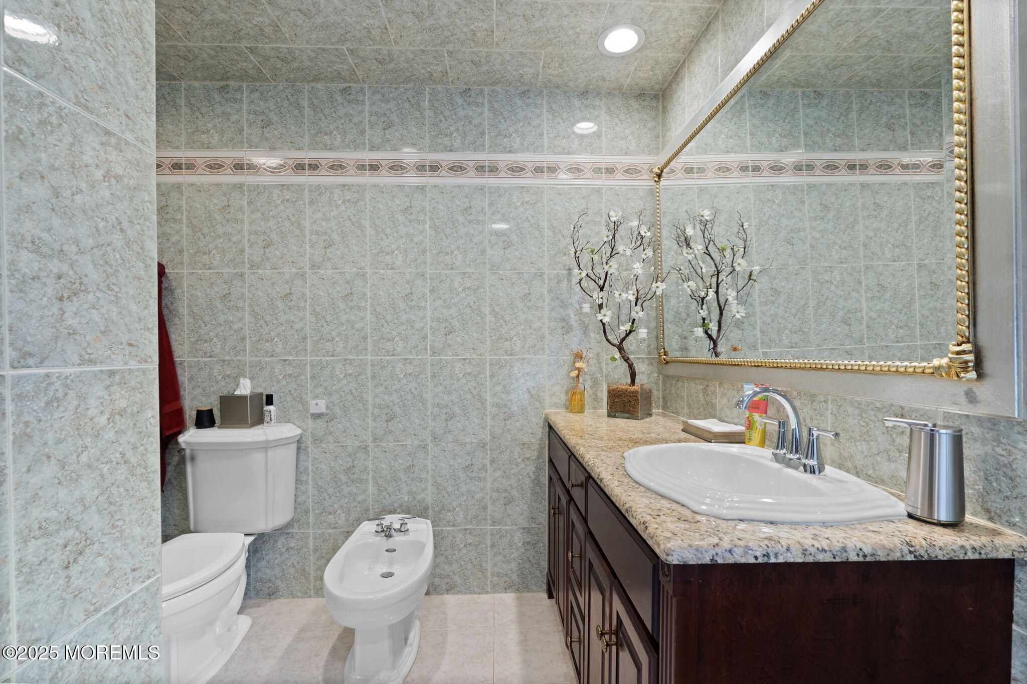 93 Wallace Road Middletown, NJ 07748 - Photo 20 of 47 a bathroom with a granite countertop sink a toilet and shower