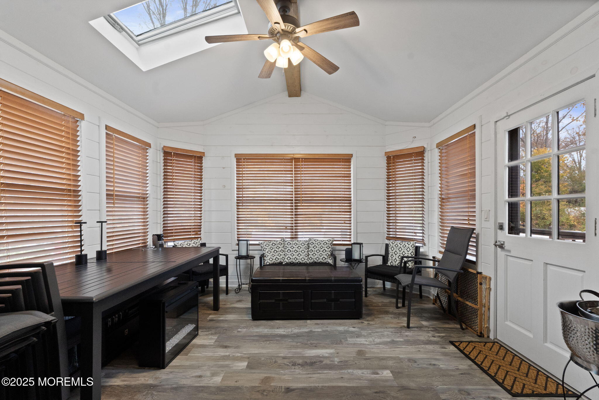 93 Wallace Road Middletown, NJ 07748 - Photo 22 of 47 a living room with furniture and large windows