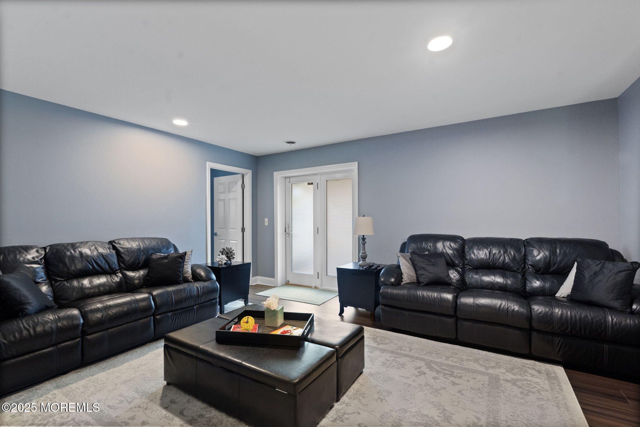 93 Wallace Road Middletown, NJ 07748 - Photo 28 of 47 a living room with furniture and a couch