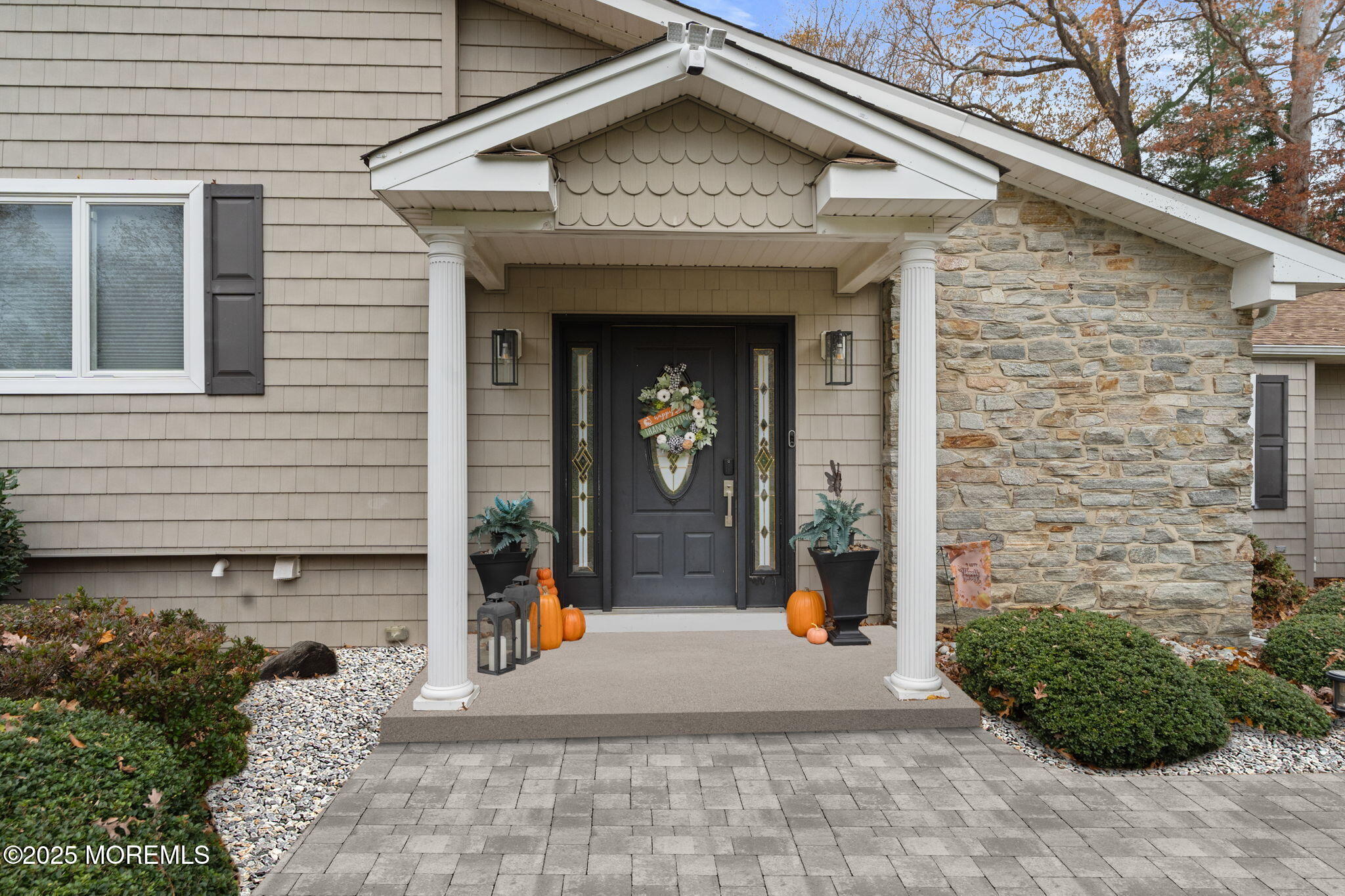 93 Wallace Road Middletown, NJ 07748 - Photo 3 of 47 a front view of a house with garden