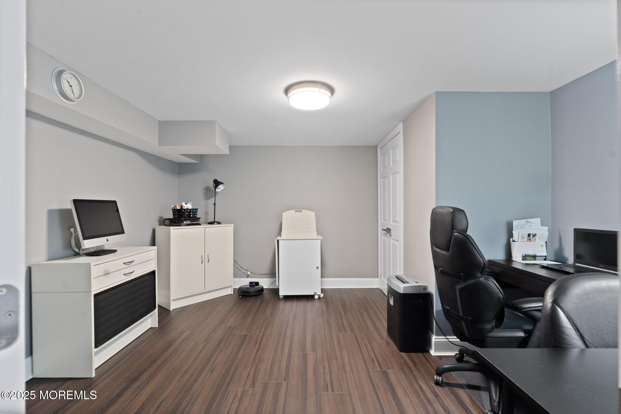 93 Wallace Road Middletown, NJ 07748 - Photo 31 of 47 a view of a workspace with furniture and a flat screen tv