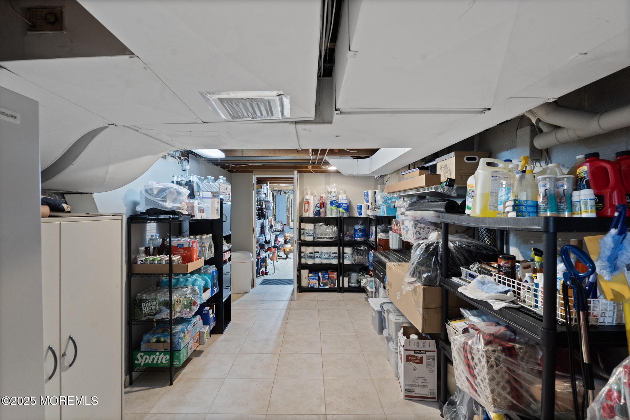 93 Wallace Road Middletown, NJ 07748 - Photo 35 of 47 a view of a storage room with a lot of stuff