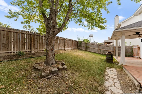 a backyard of a house with lots of green space