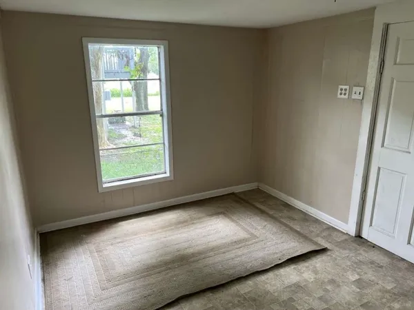 an empty room with a window