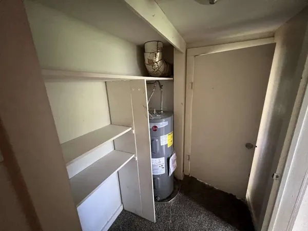 a white bath tub sitting in a bathroom