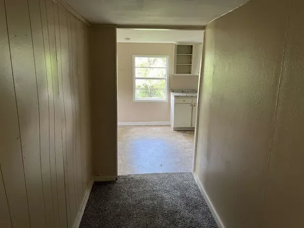 a view of hallway with window