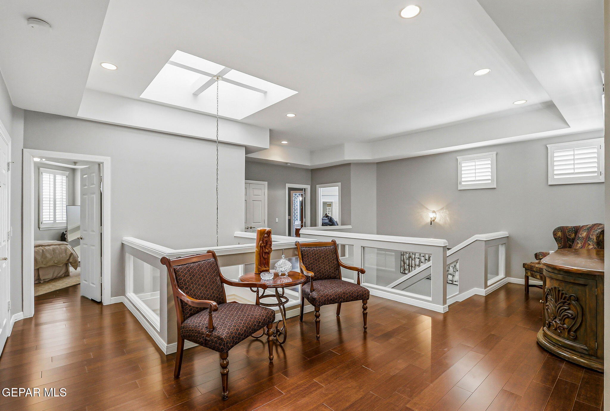 5806 Diamond Point Circle El Paso, TX 79912 - Photo 26 of 61 a workspace with furniture and wooden floor