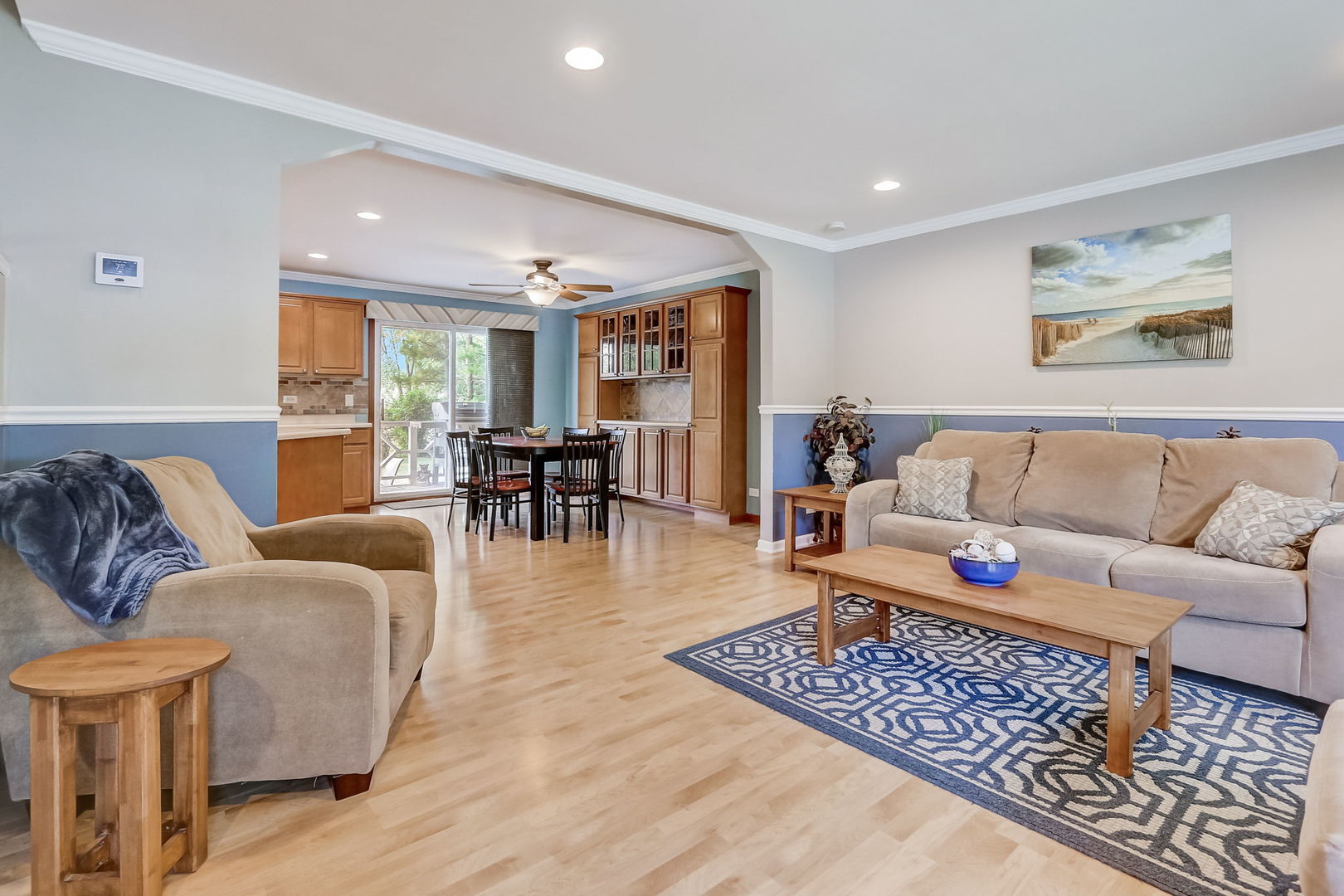 875 Harrison Lane Hoffman Estates, IL 60192 - Photo 4 of 31 a living room with furniture and wooden floor