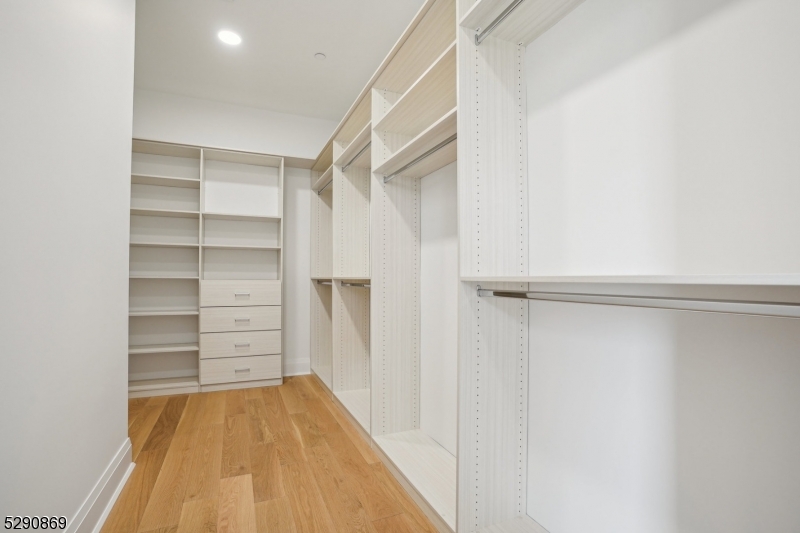 620 Bloomfield Avenue, Unit PHD Bloomfield, NJ 07003 - Photo 14 of 24 a view of walk in closet with empty racks