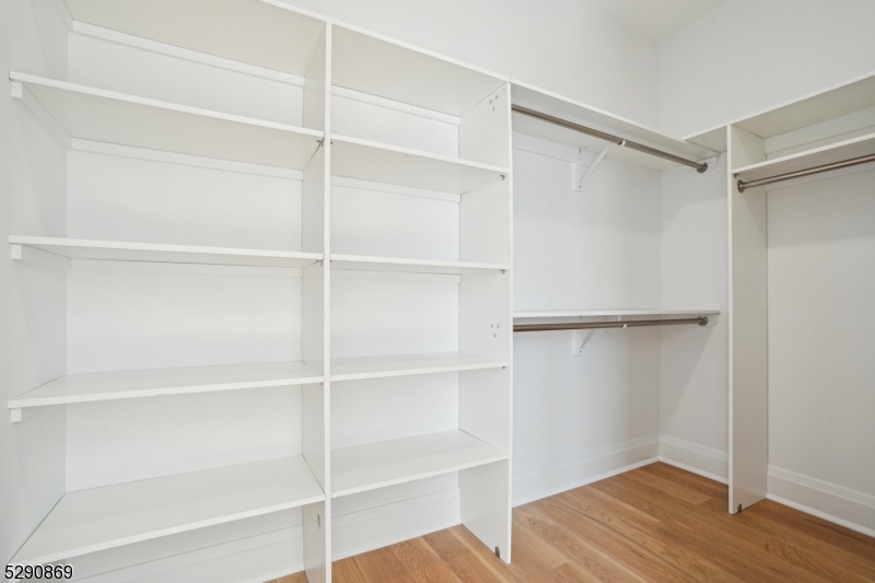 620 Bloomfield Avenue, Unit PHD Bloomfield, NJ 07003 - Photo 16 of 24 a view of walk in closet with empty racks