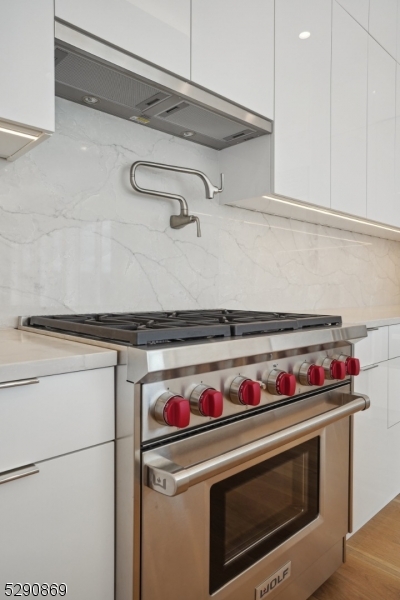 620 Bloomfield Avenue, Unit PHD Bloomfield, NJ 07003 - Photo 3 of 24 a stove top oven sitting inside of a kitchen