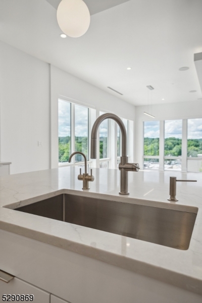 620 Bloomfield Avenue, Unit PHD Bloomfield, NJ 07003 - Photo 4 of 24 a view with a sink and cabinet