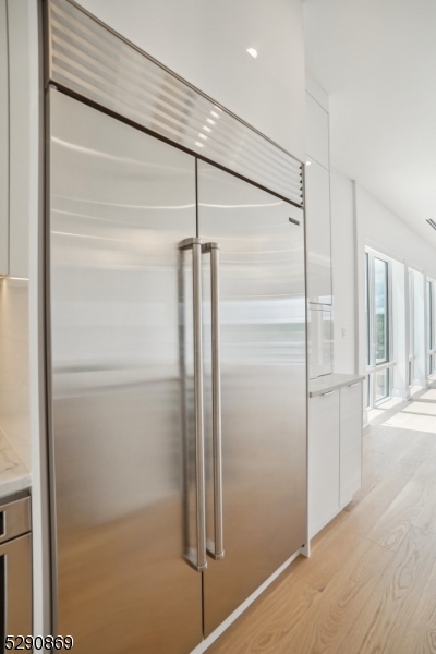620 Bloomfield Avenue, Unit PHD Bloomfield, NJ 07003 - Photo 5 of 24 a bathroom with a glass shower door