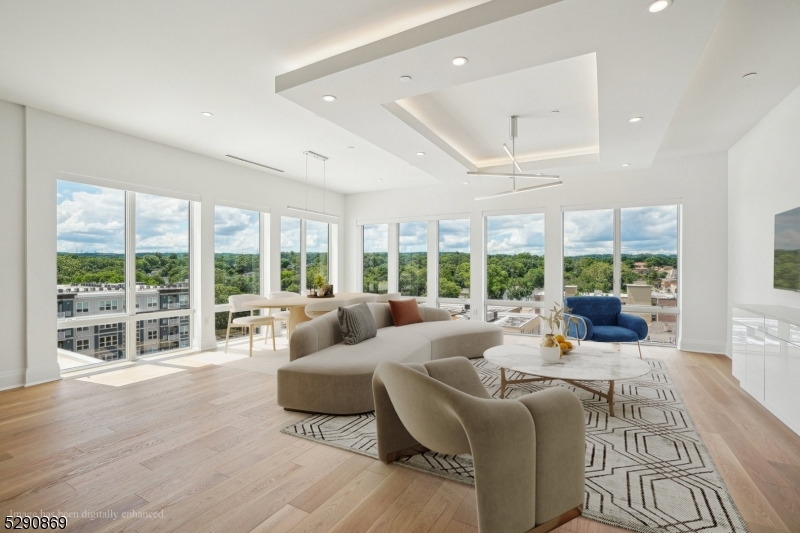 620 Bloomfield Avenue, Unit PHD Bloomfield, NJ 07003 - Photo 8 of 24 a living room with furniture and large windows