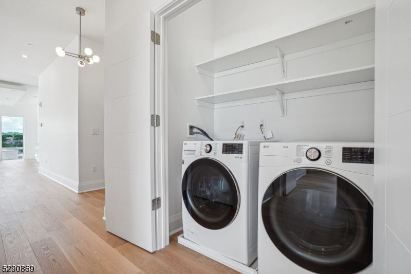 620 Bloomfield Avenue, Unit PHD Bloomfield, NJ 07003 - Photo 9 of 24 a view of a hallway with washer and dryer