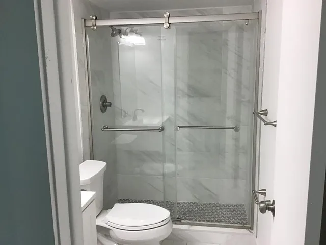 a bathroom with a sink and mirror