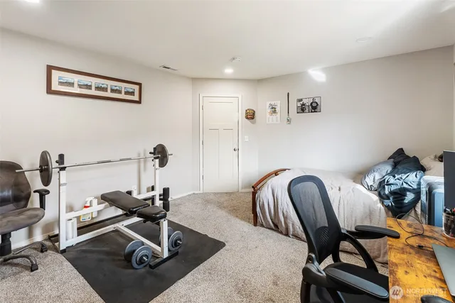 a view of a workspace with furniture and