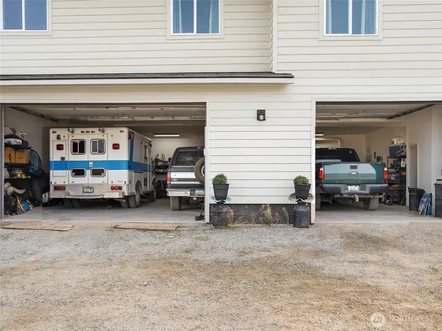 a view of a cars park in front of house