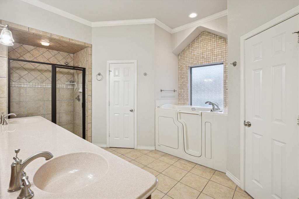 548 Highland Road Springtown, TX 76082 - Photo 21 of 40 a bathroom with a sink and a mirror