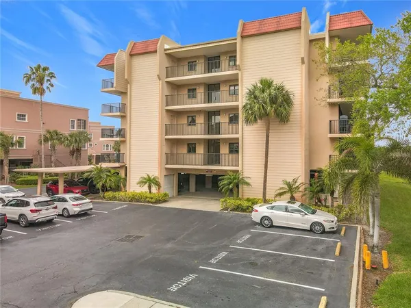 a view of a street with cars