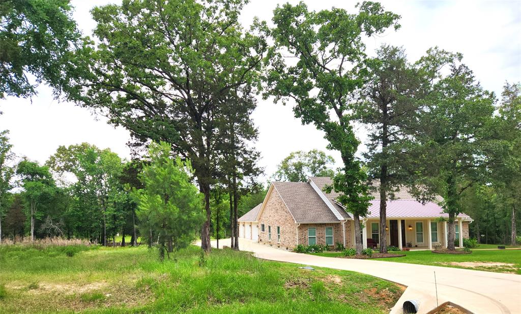 9042 Safari Bluff Larue, TX 75770 - Photo 8 of 40 a view of house with a big yard