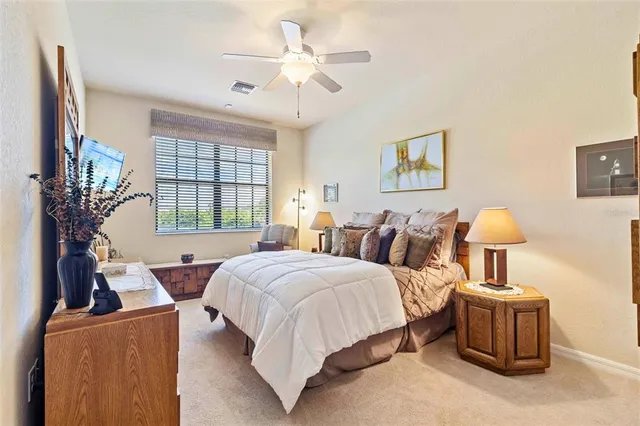 a bed room with a bed and a couch