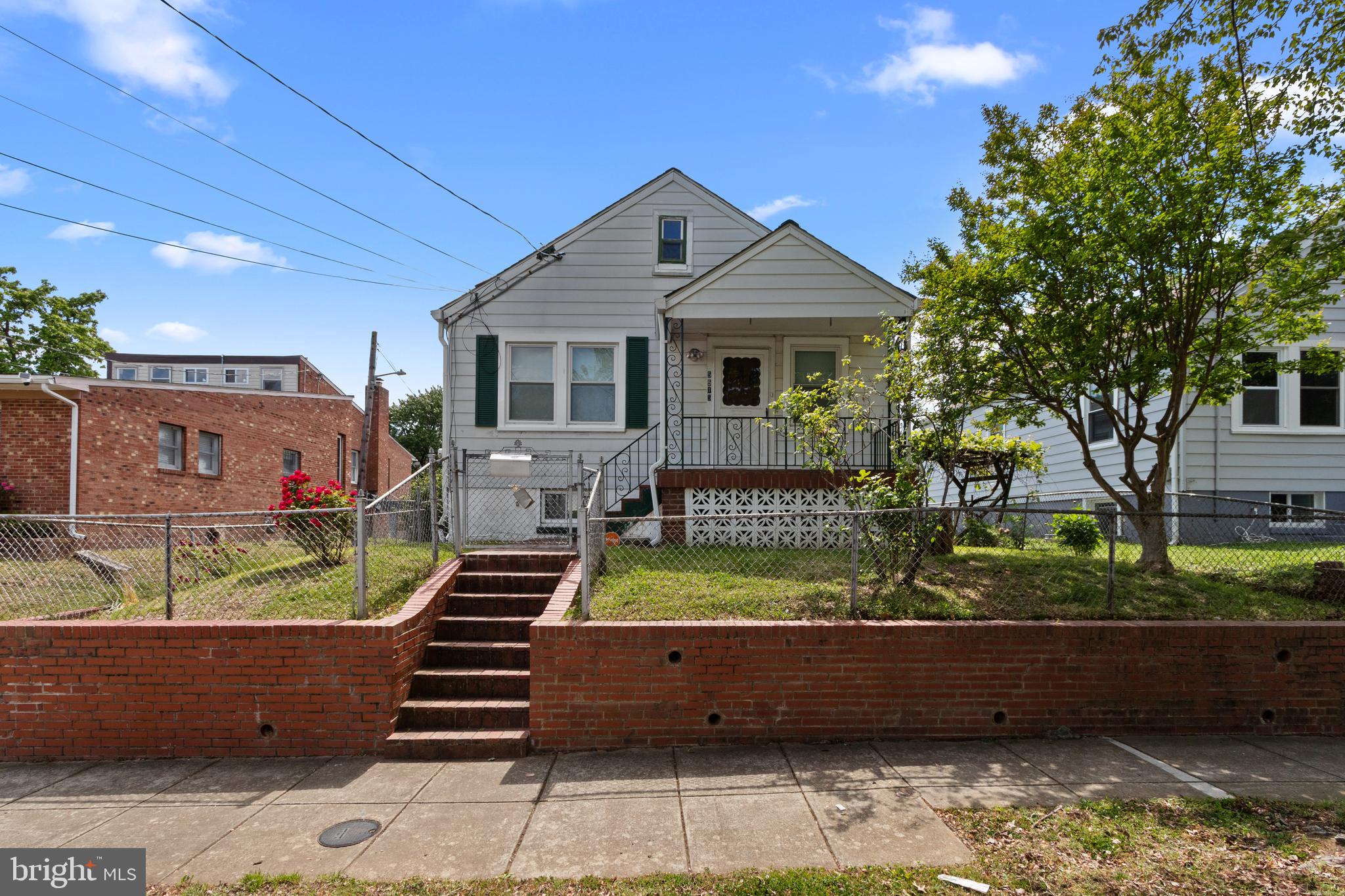 5515 Jay Street Northeast Washington, DC 20019 - Photo 1 of 20 a front view of a house with a yard