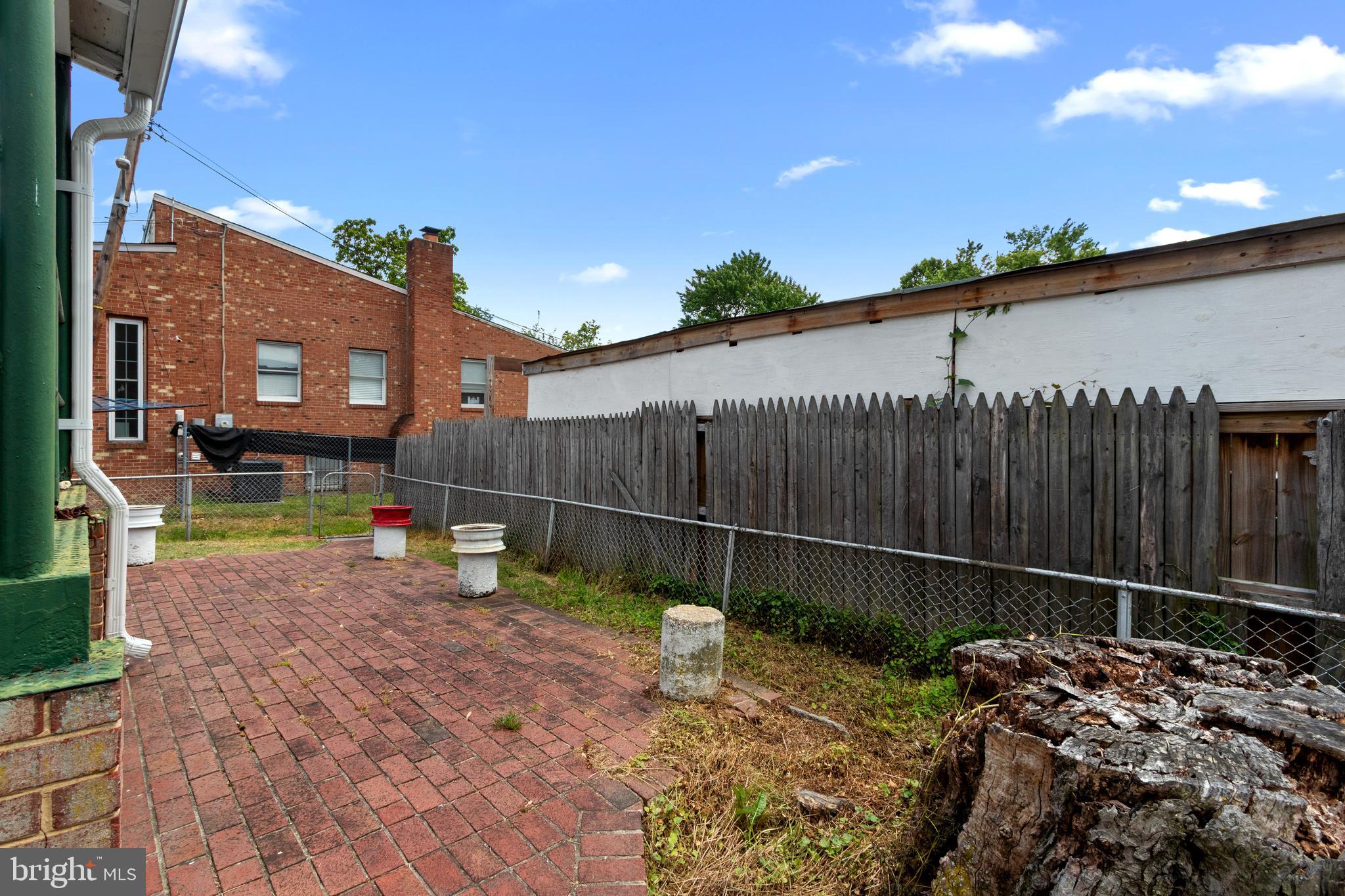 5515 Jay Street Northeast Washington, DC 20019 - Photo 18 of 20 a backyard of a house with lots of green space