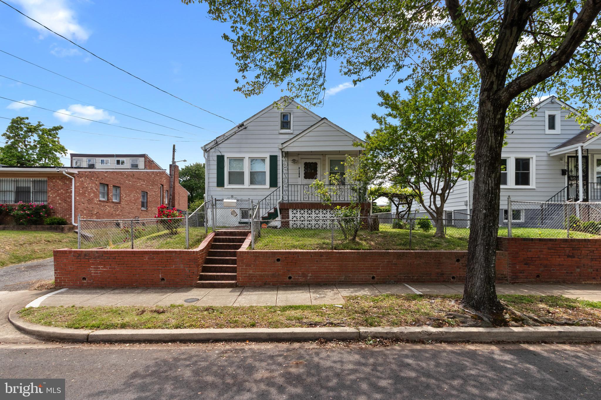 5515 Jay Street Northeast Washington, DC 20019 - Photo 20 of 20 a front view of a house with a yard