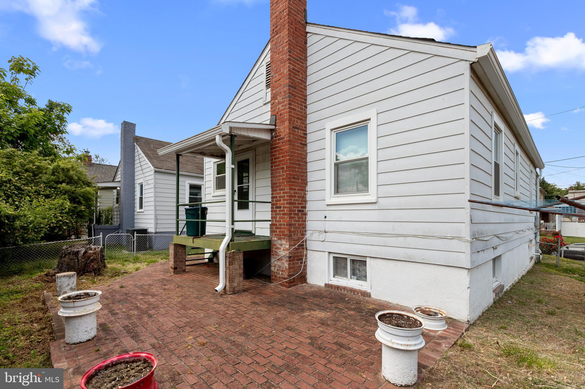5515 Jay Street Northeast Washington, DC 20019 - Photo 2 of 20 a front view of a house with a chairs and table