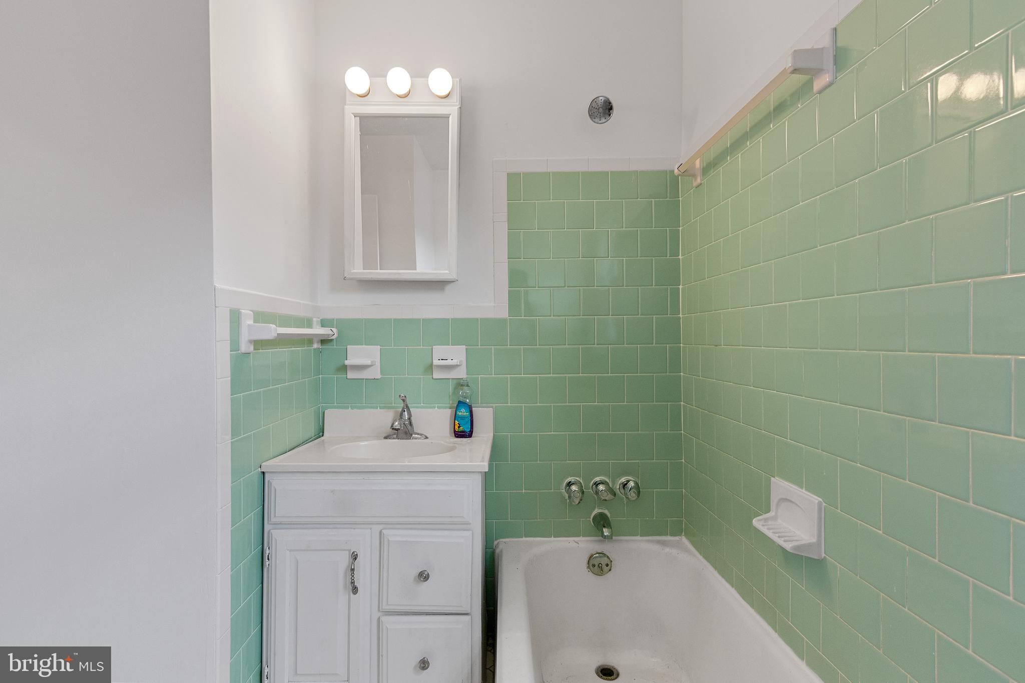 5515 Jay Street Northeast Washington, DC 20019 - Photo 3 of 20 a bathroom with a sink a toilet and shower