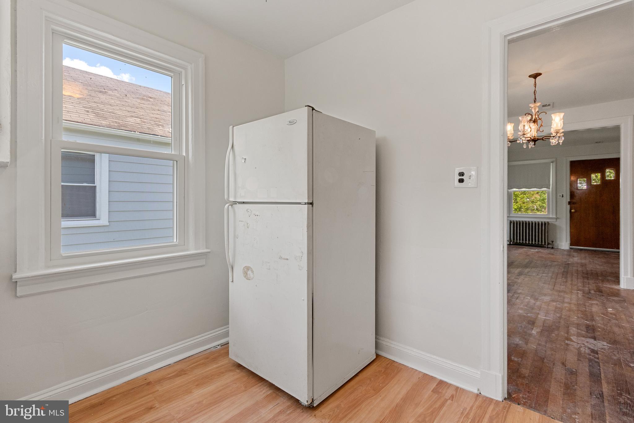 5515 Jay Street Northeast Washington, DC 20019 - Photo 10 of 20 a view of a room with wooden floor and workspace