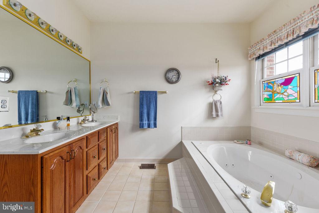 19691 Airmont Road Round Hill, VA 20141 - Photo 24 of 74 Double Sinks & Soaking Tub