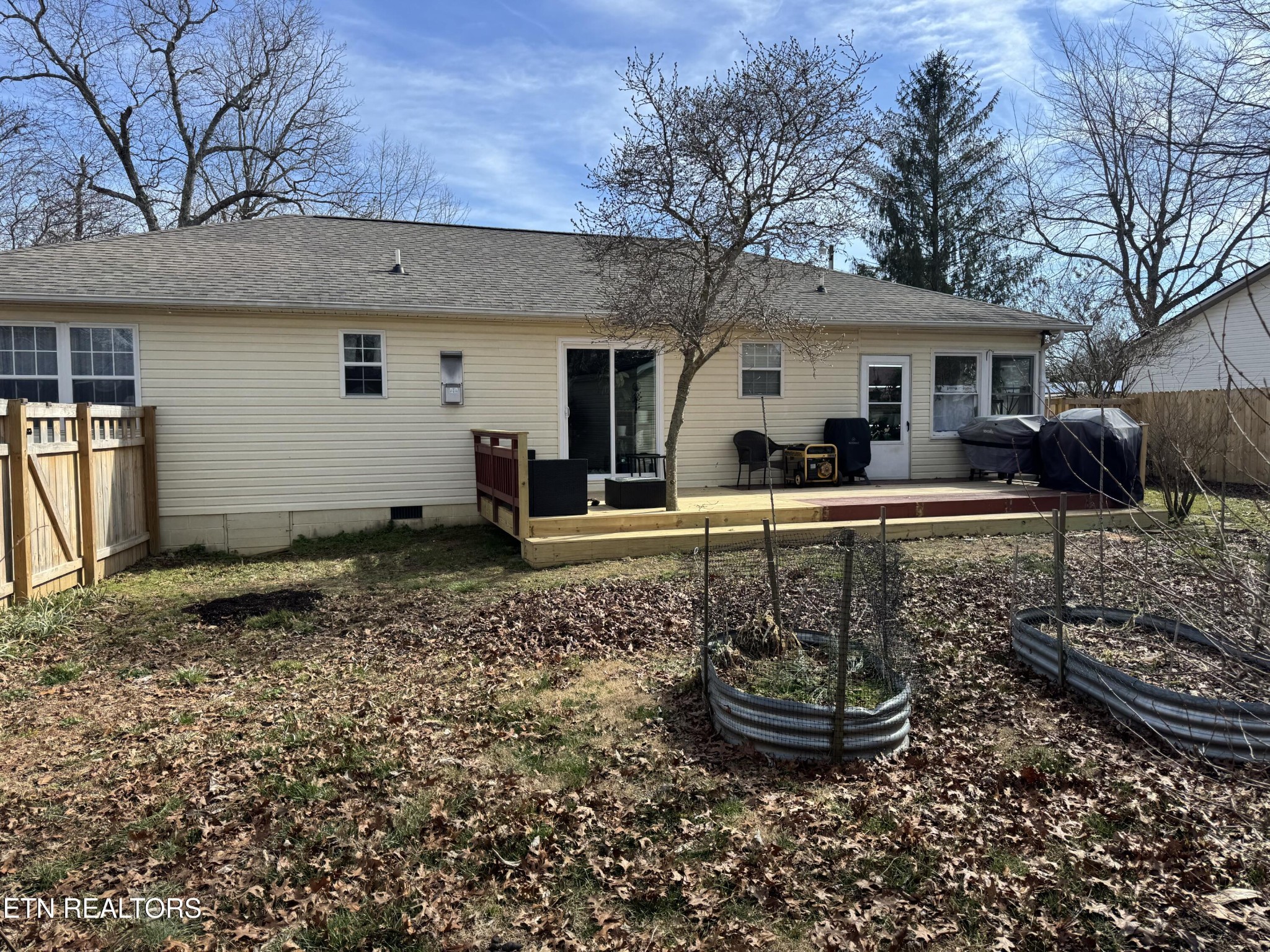 15 Rena Circle Crossville, TN 38572 - Photo 3 of 14 a front view of a house with garden
