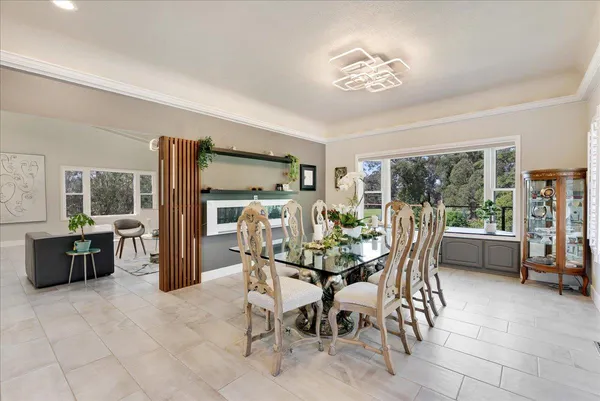 a kitchen with stainless steel appliances granite countertop a stove and a refrigerator
