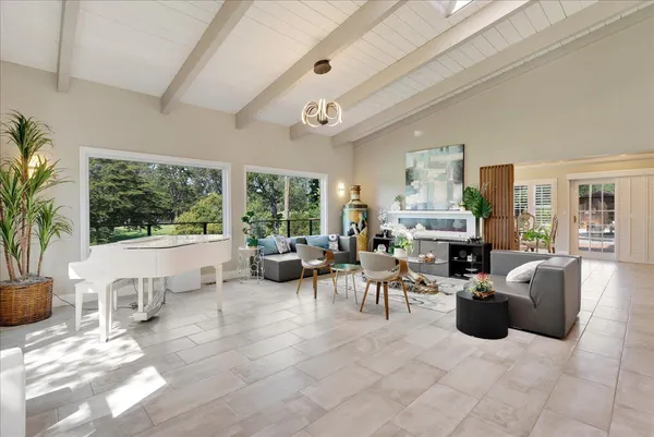 a kitchen with stainless steel appliances granite countertop a sink and a stove