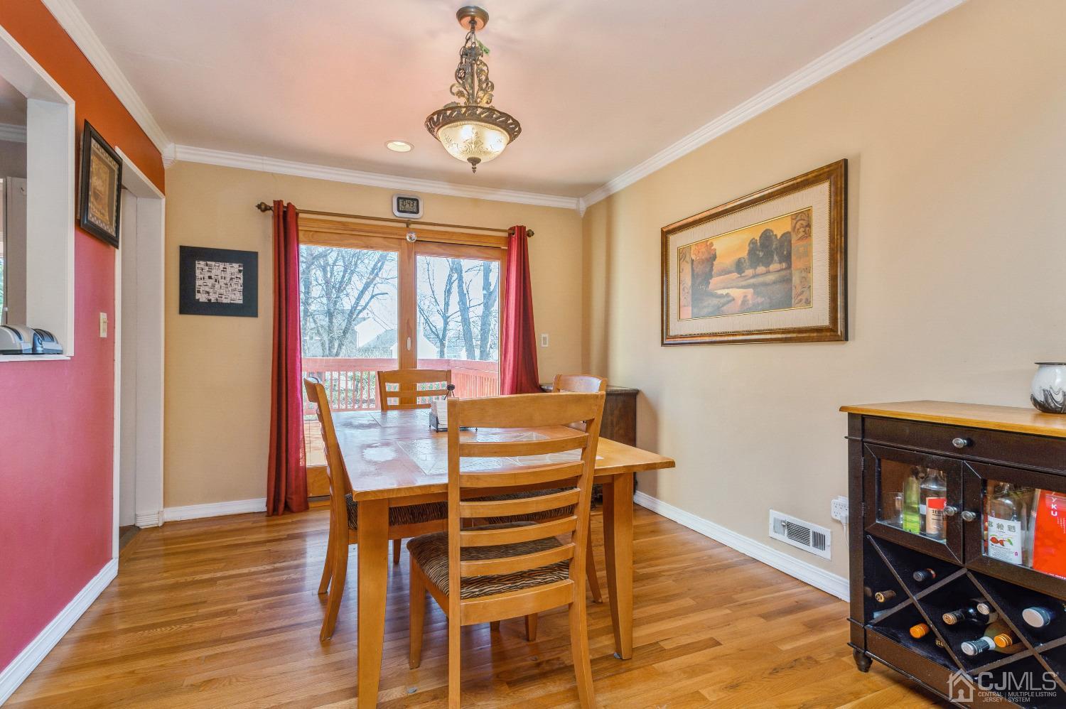 2 Sherwood Road Edison, NJ 08820 - Photo 11 of 26 a view of a dining room with furniture window and wooden floor