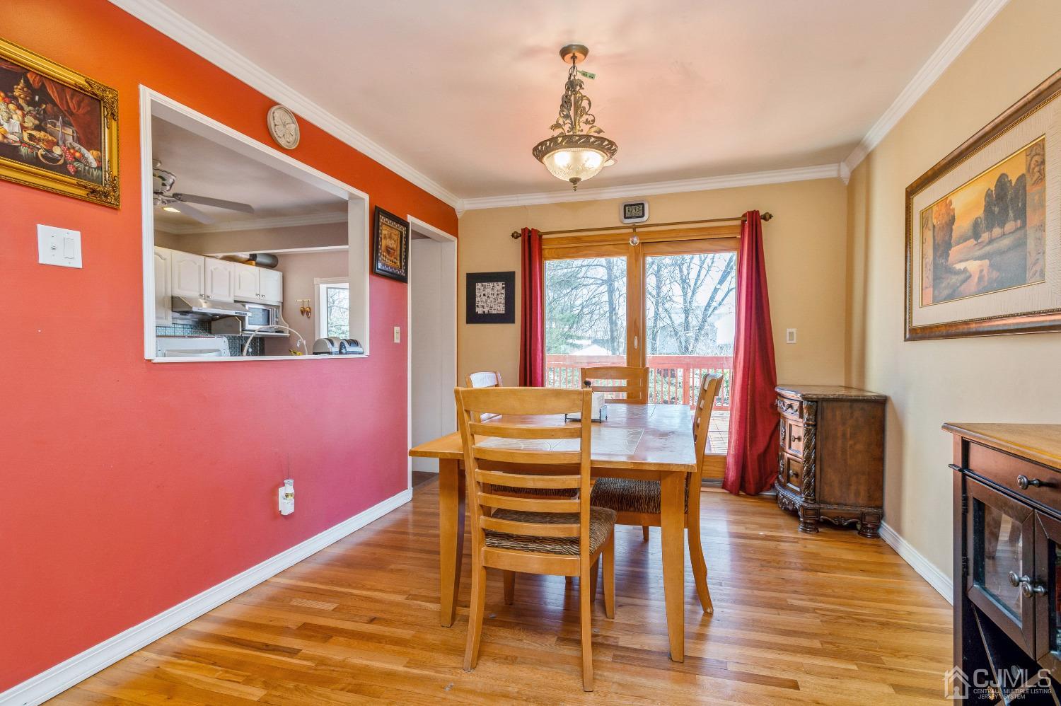 2 Sherwood Road Edison, NJ 08820 - Photo 12 of 26 a view of a livingroom with furniture window and wooden floor