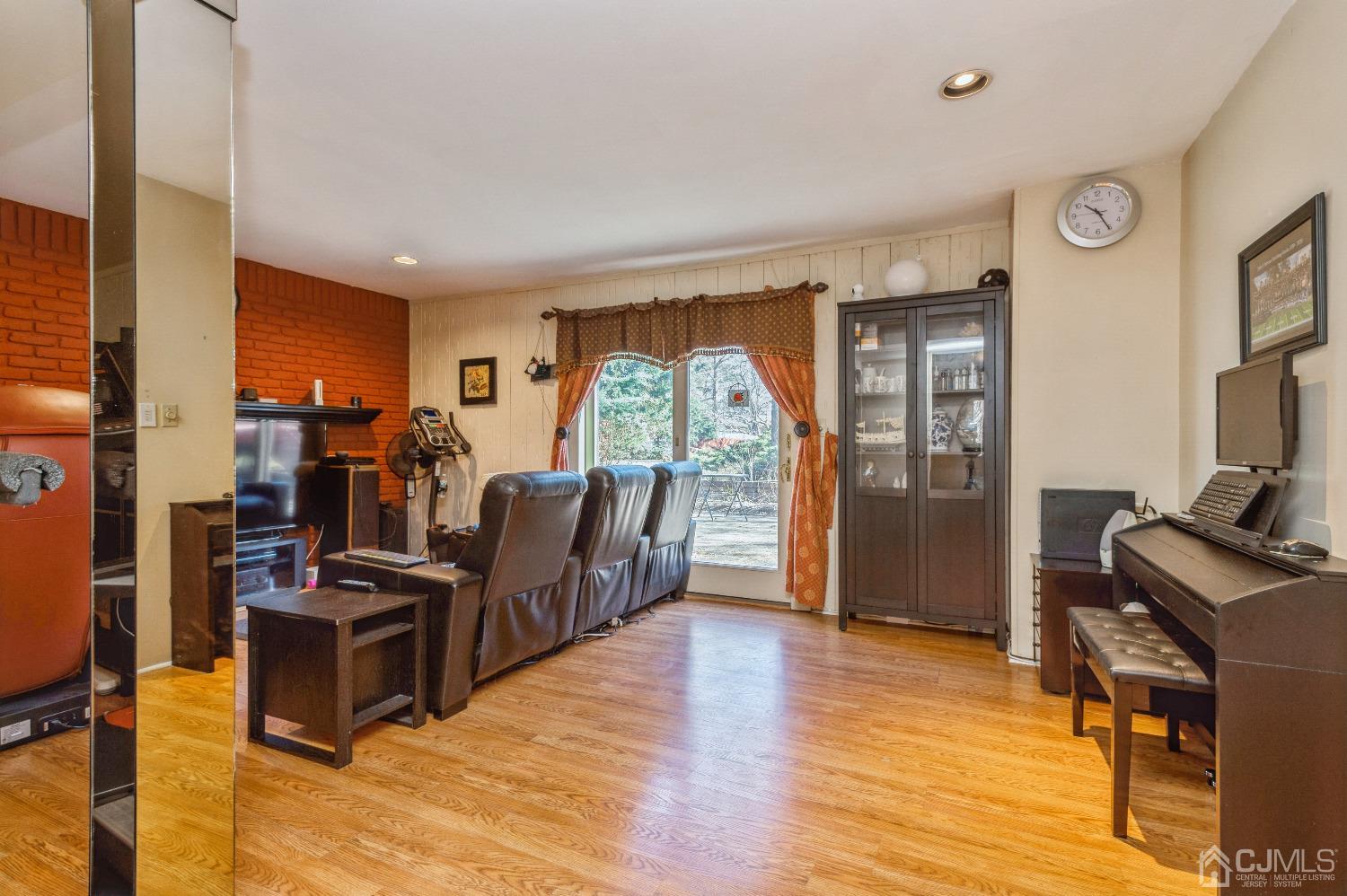 2 Sherwood Road Edison, NJ 08820 - Photo 14 of 26 a view of a livingroom with furniture workspace and a window