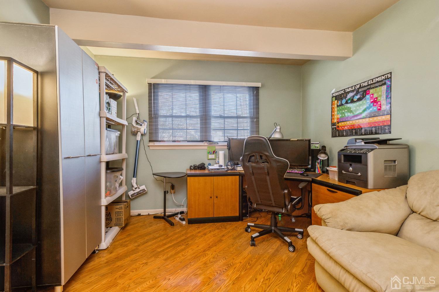 2 Sherwood Road Edison, NJ 08820 - Photo 18 of 26 a view of a livingroom with workspace and a window