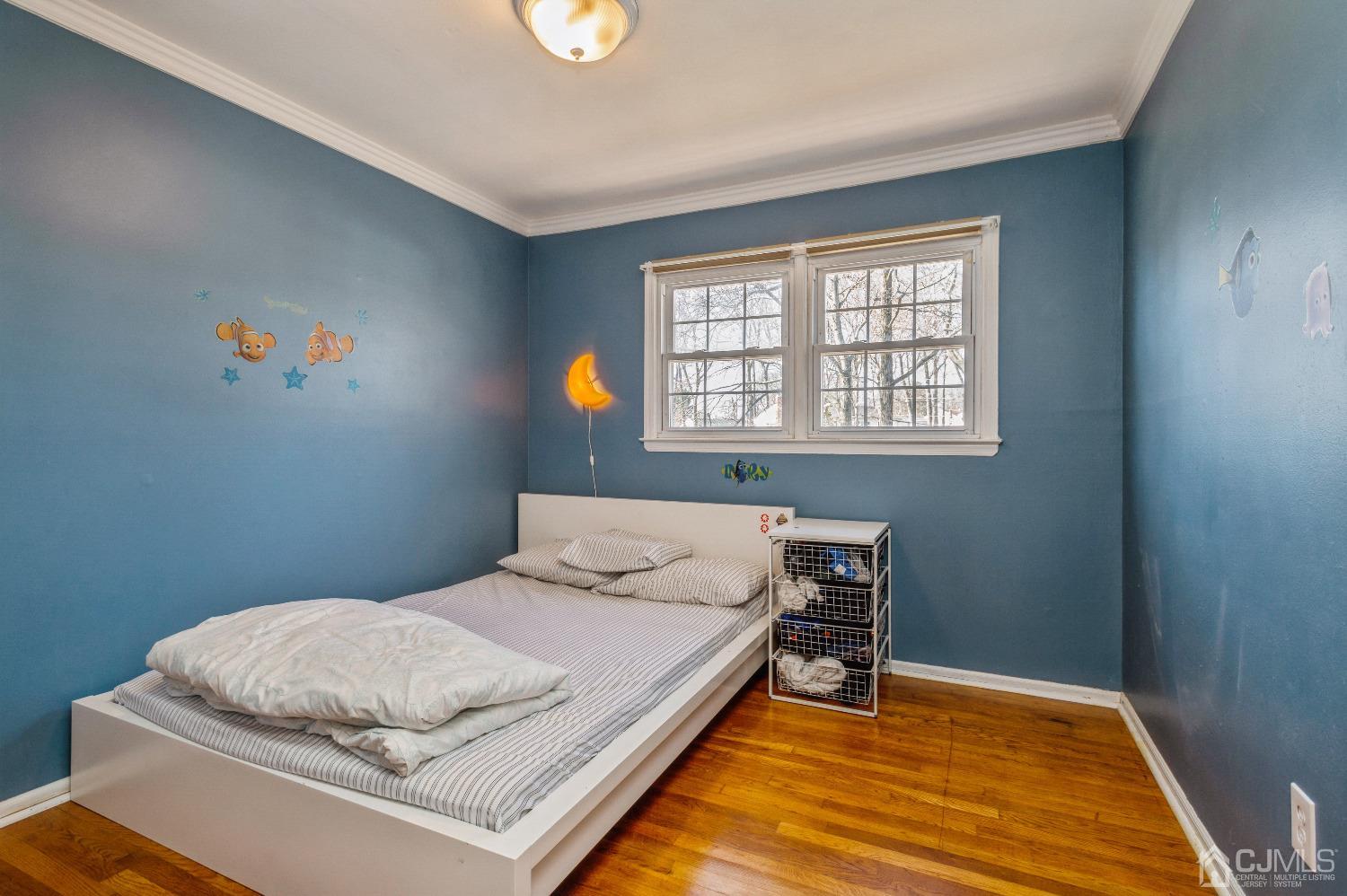 2 Sherwood Road Edison, NJ 08820 - Photo 19 of 26 a bedroom with a bed and window
