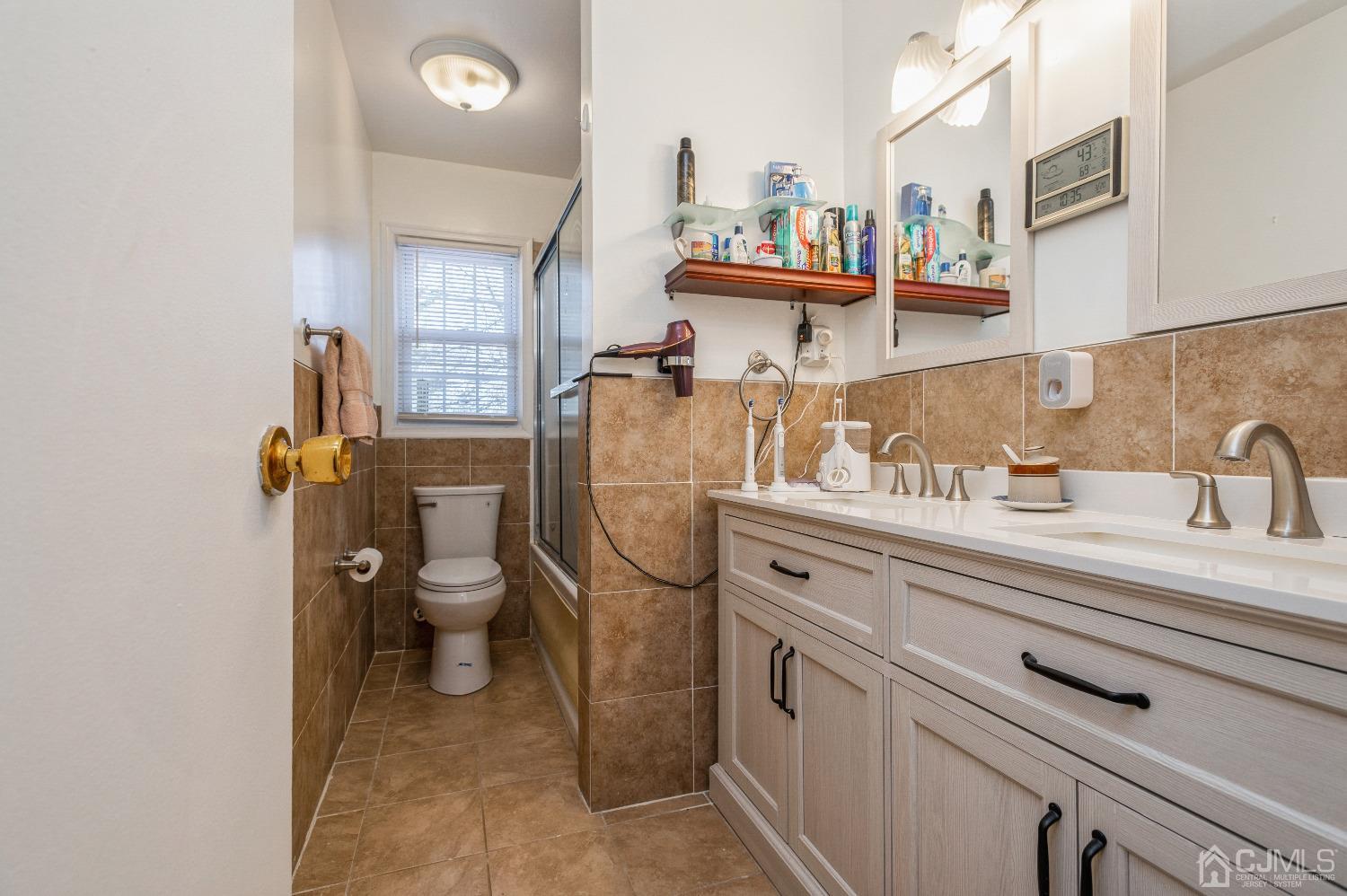 2 Sherwood Road Edison, NJ 08820 - Photo 21 of 26 a utility room with dryer washer and sink
