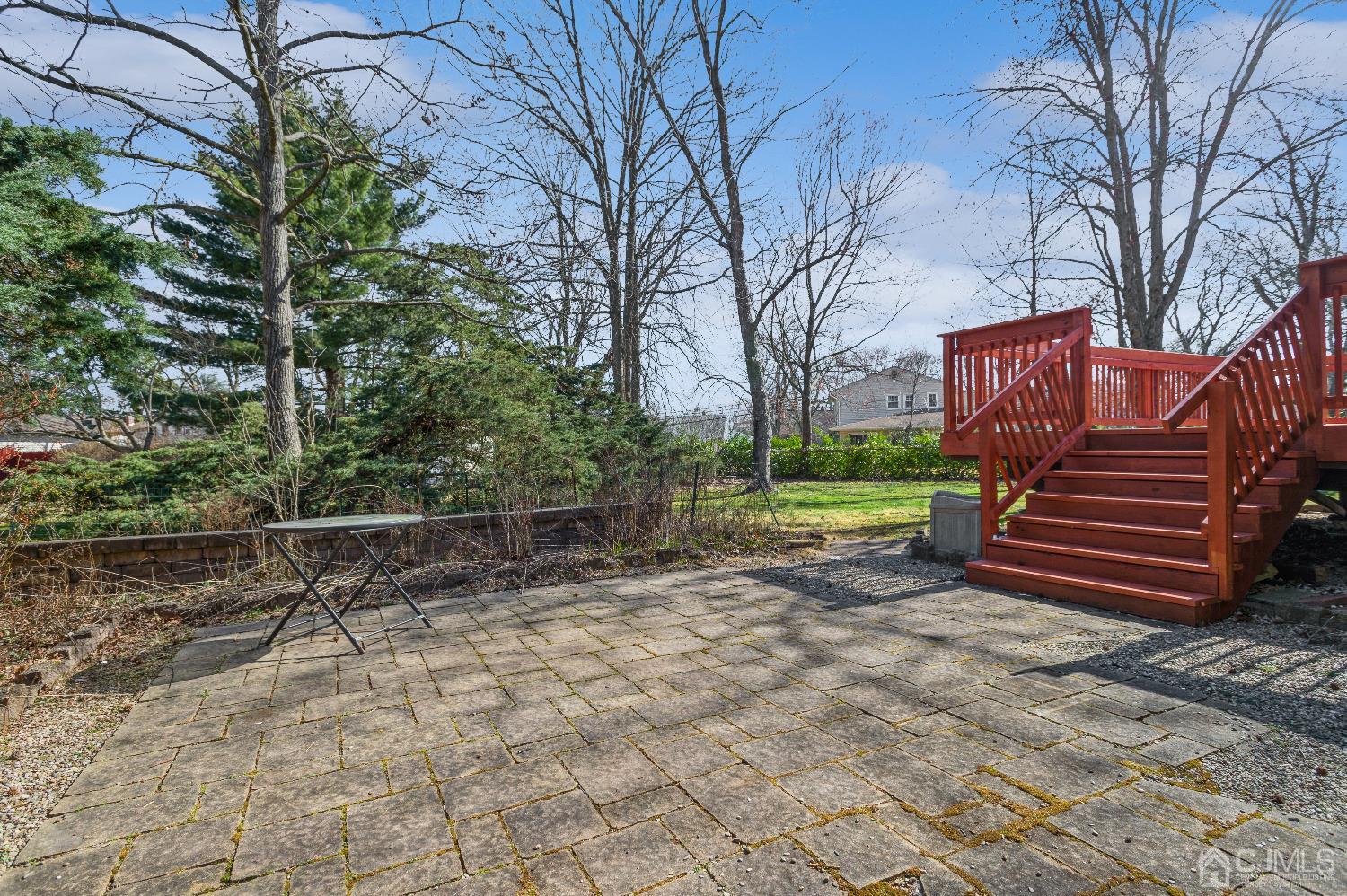 2 Sherwood Road Edison, NJ 08820 - Photo 25 of 26 a view of a yard with plants and a large tree