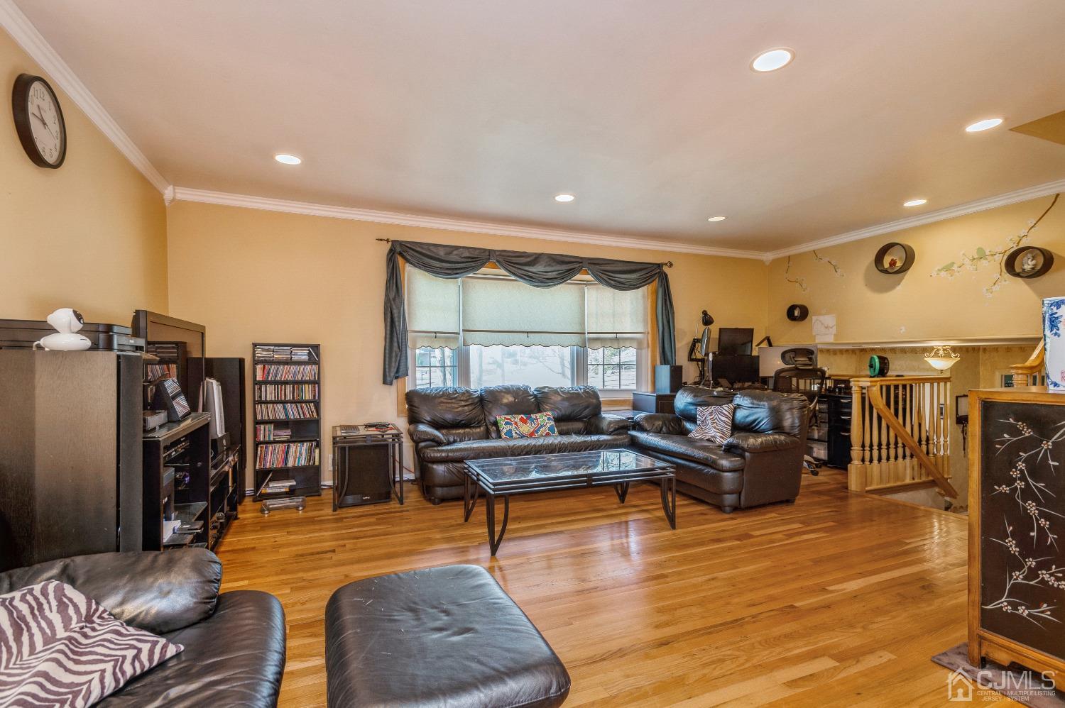 2 Sherwood Road Edison, NJ 08820 - Photo 4 of 26 a living room with furniture and a large window